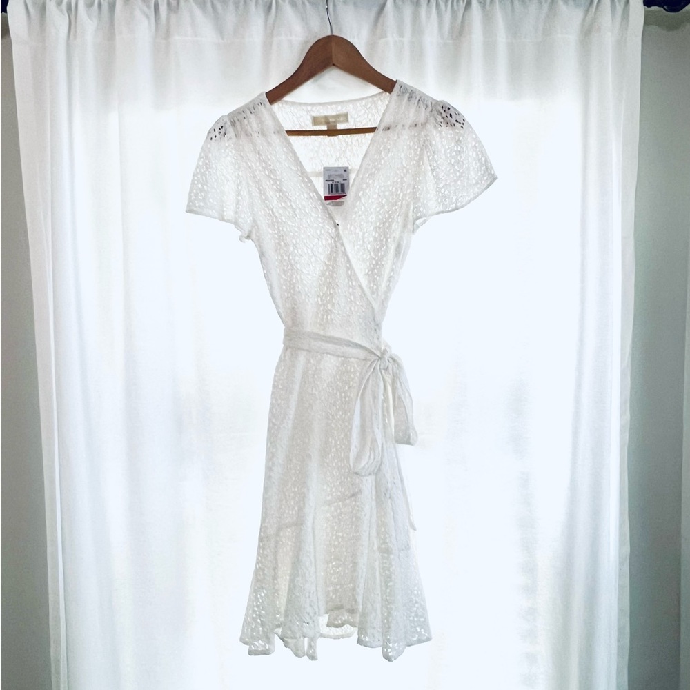 Michael Kors XS white crossover lace dress with ruffle hem & tie closure. NWT.